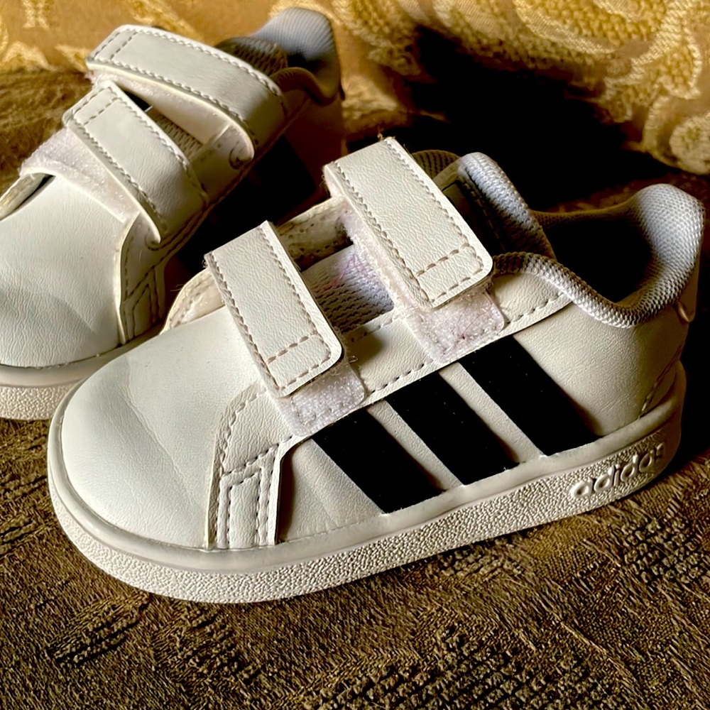 Adidas sneakers. Barley touched the ground. Like new